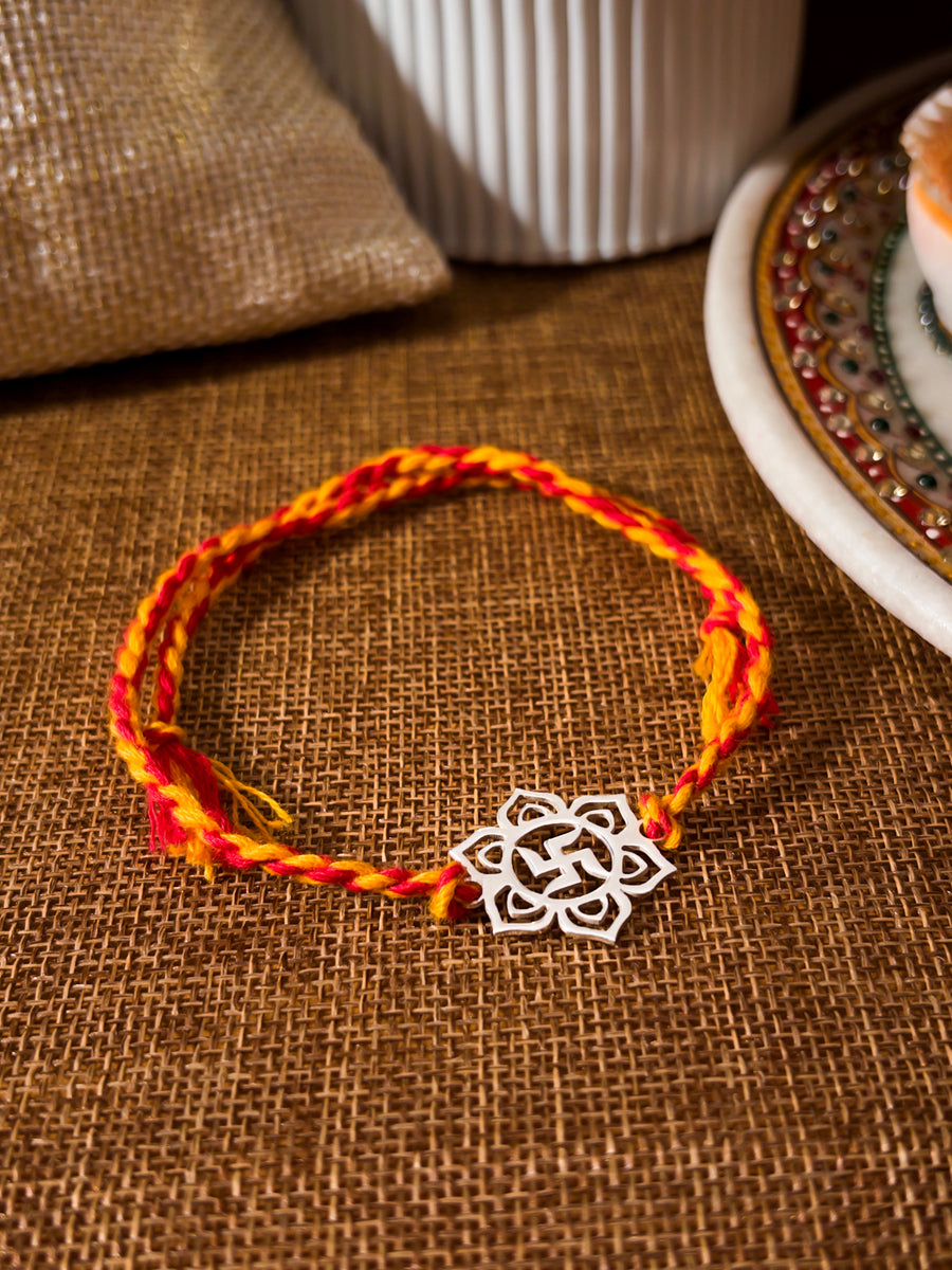 Silver Floral Swastik Rakhi